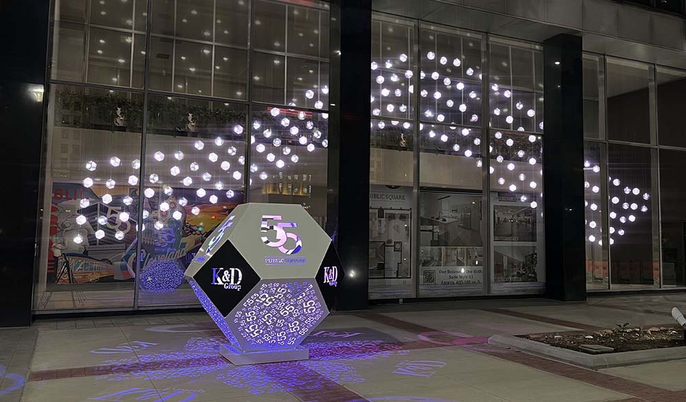Kinetic installation in the form of a white wave for K&D group