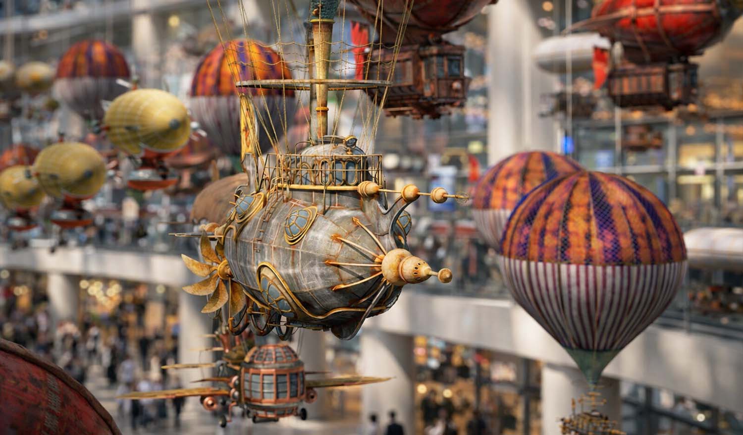 Close-up of the Floating Fleet installation featuring a steampunk airship with a metallic body and brass details suspended inside a modern airport atrium among colorful balloons.