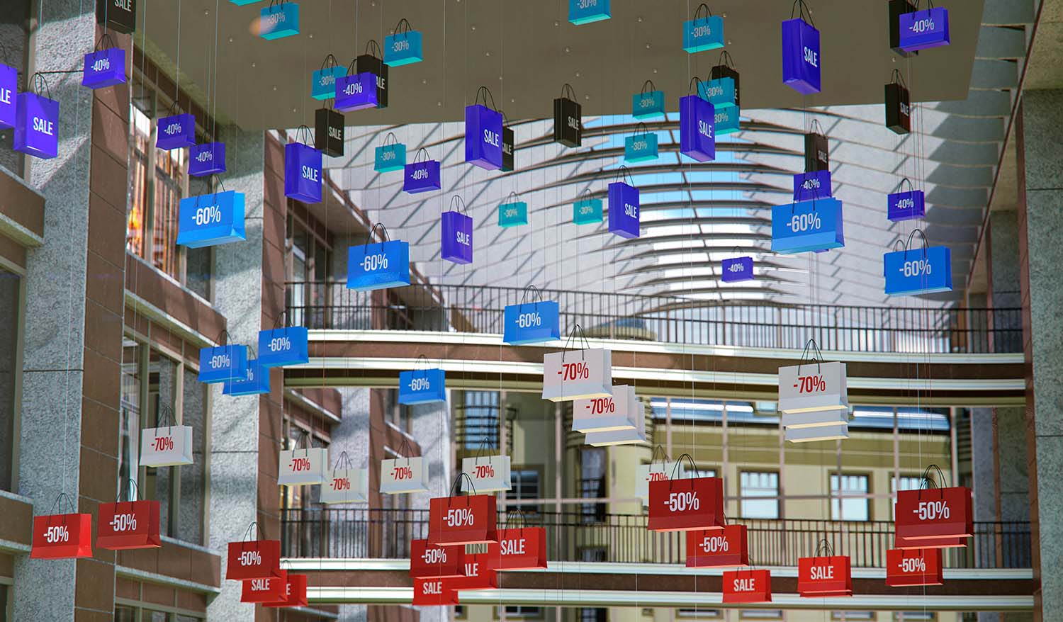 Кинетическая инсталляция Shopping Vortex в атриуме торгового центра — подвешенные разноцветные пакеты с надписями SALE и процентами скидок (-40%, -50%, -60%, -70%) формируют динамичную пространственную композицию под стеклянной крышей.